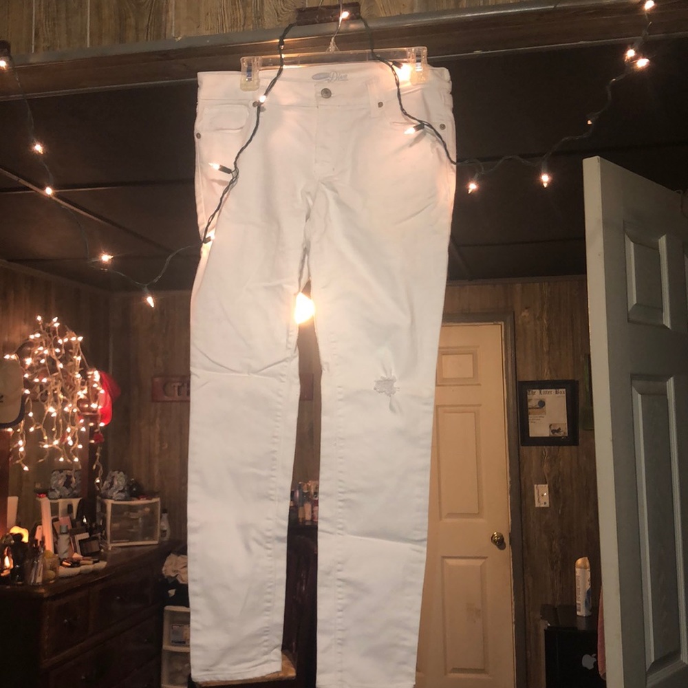 Slightly ripped white jeans